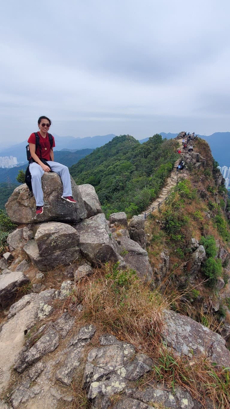 me sitting atop lion rock, hong kong